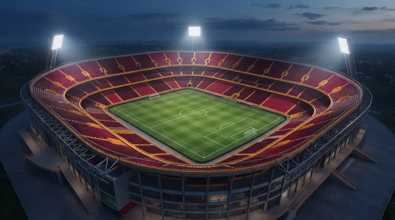 Fußballstadion bei Dunkelheit mit beleuchteten Tribünen und Spielfeld